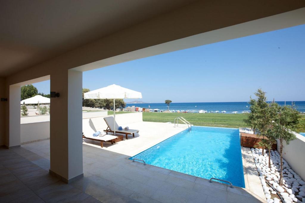 Bungalowsuite-aan-het-Strand-met-Prive-Zwembad